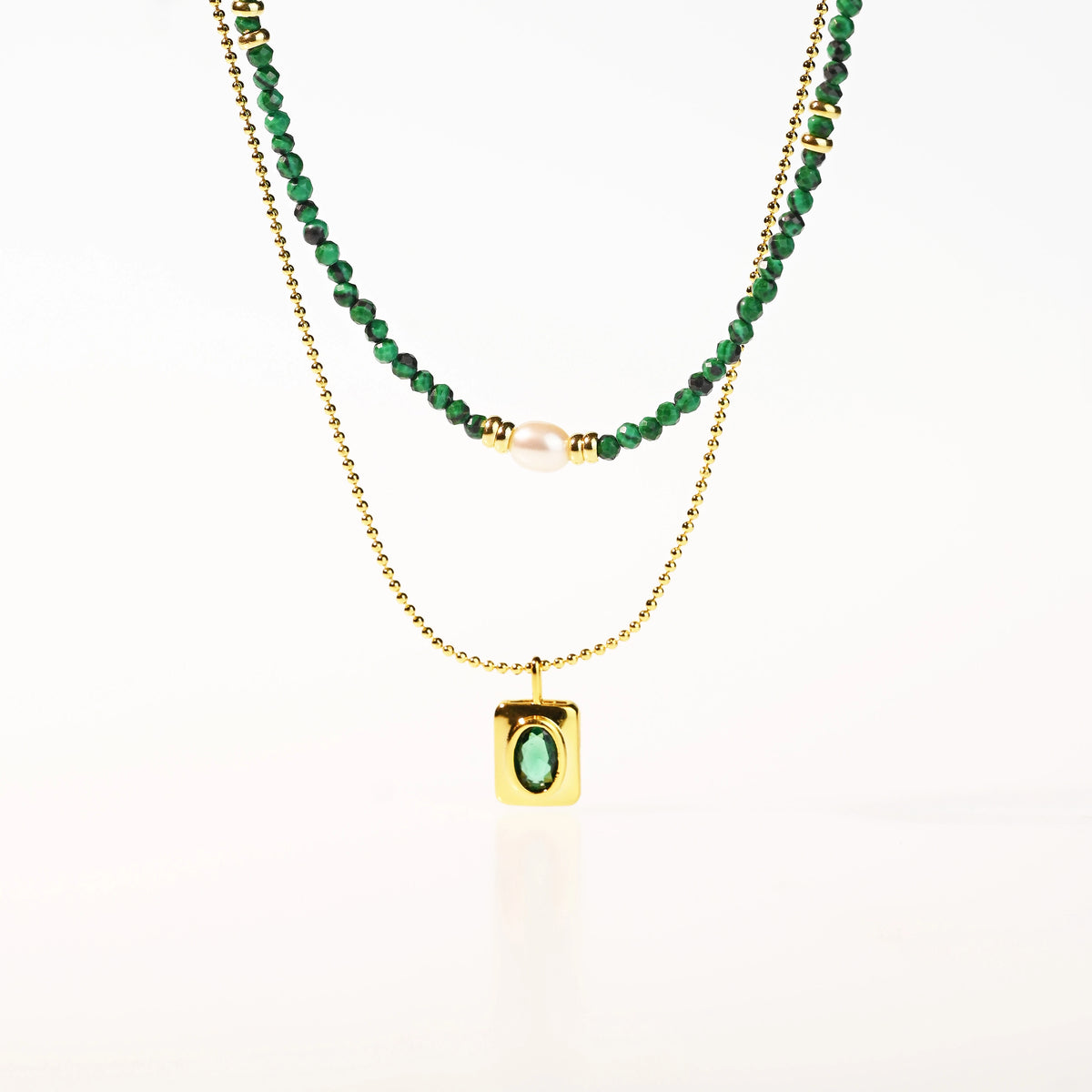 The Harmonious Dance of Light and Nature: A Layered Emerald Green Pearl Necklace of Timeless Elegance