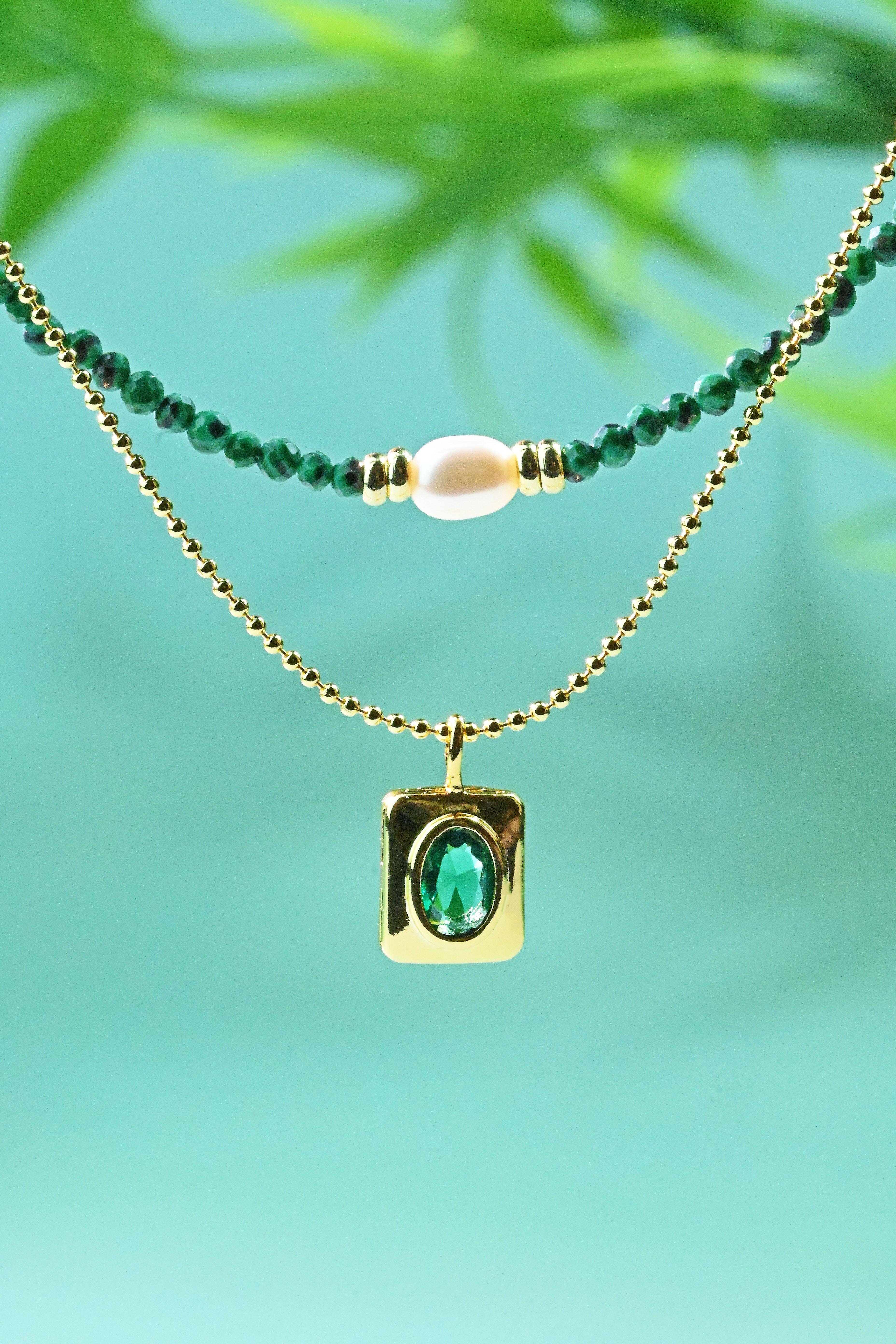 The Harmonious Dance of Light and Nature: A Layered Emerald Green Pearl Necklace of Timeless Elegance