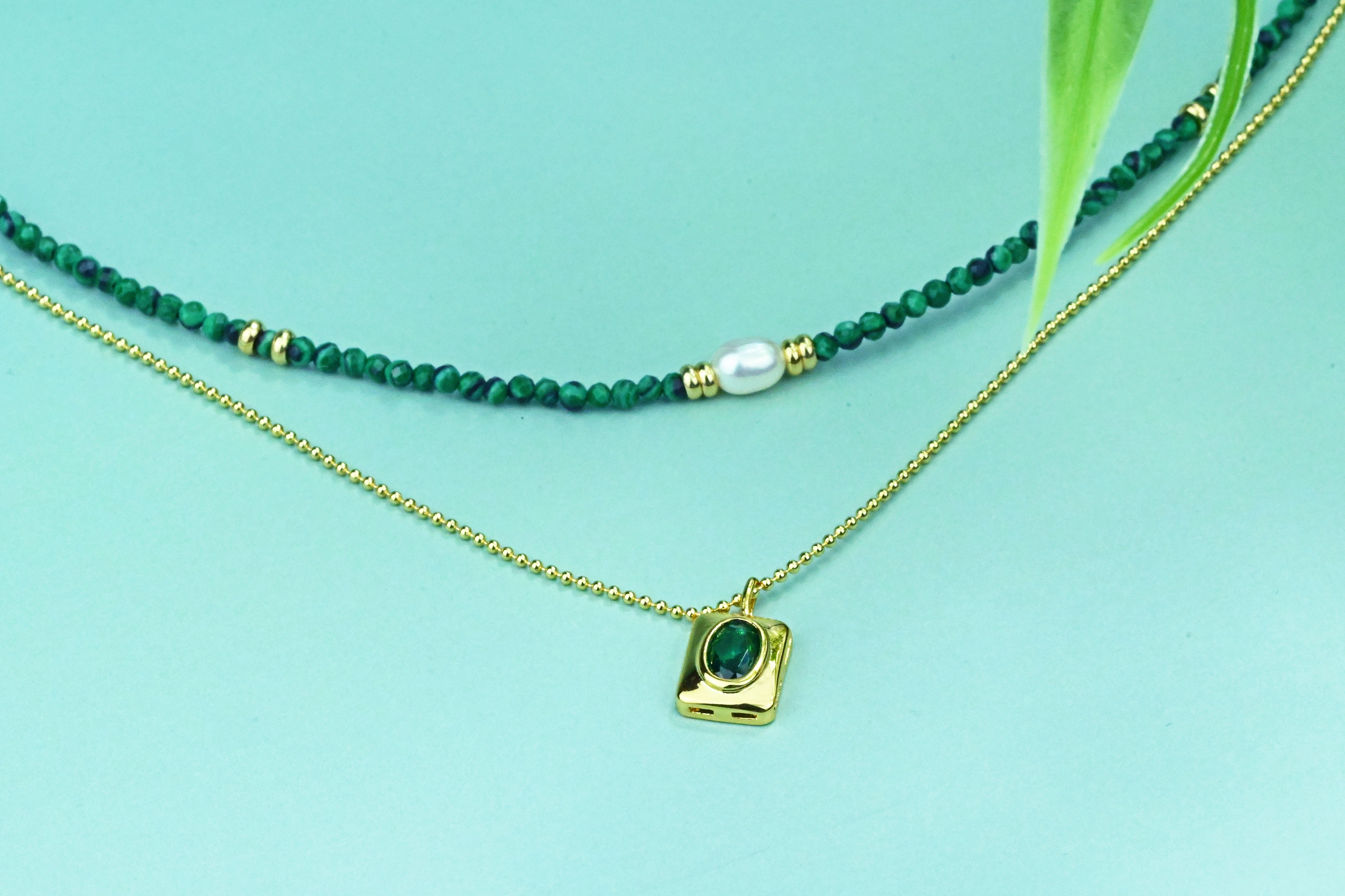 The Harmonious Dance of Light and Nature: A Layered Emerald Green Pearl Necklace of Timeless Elegance